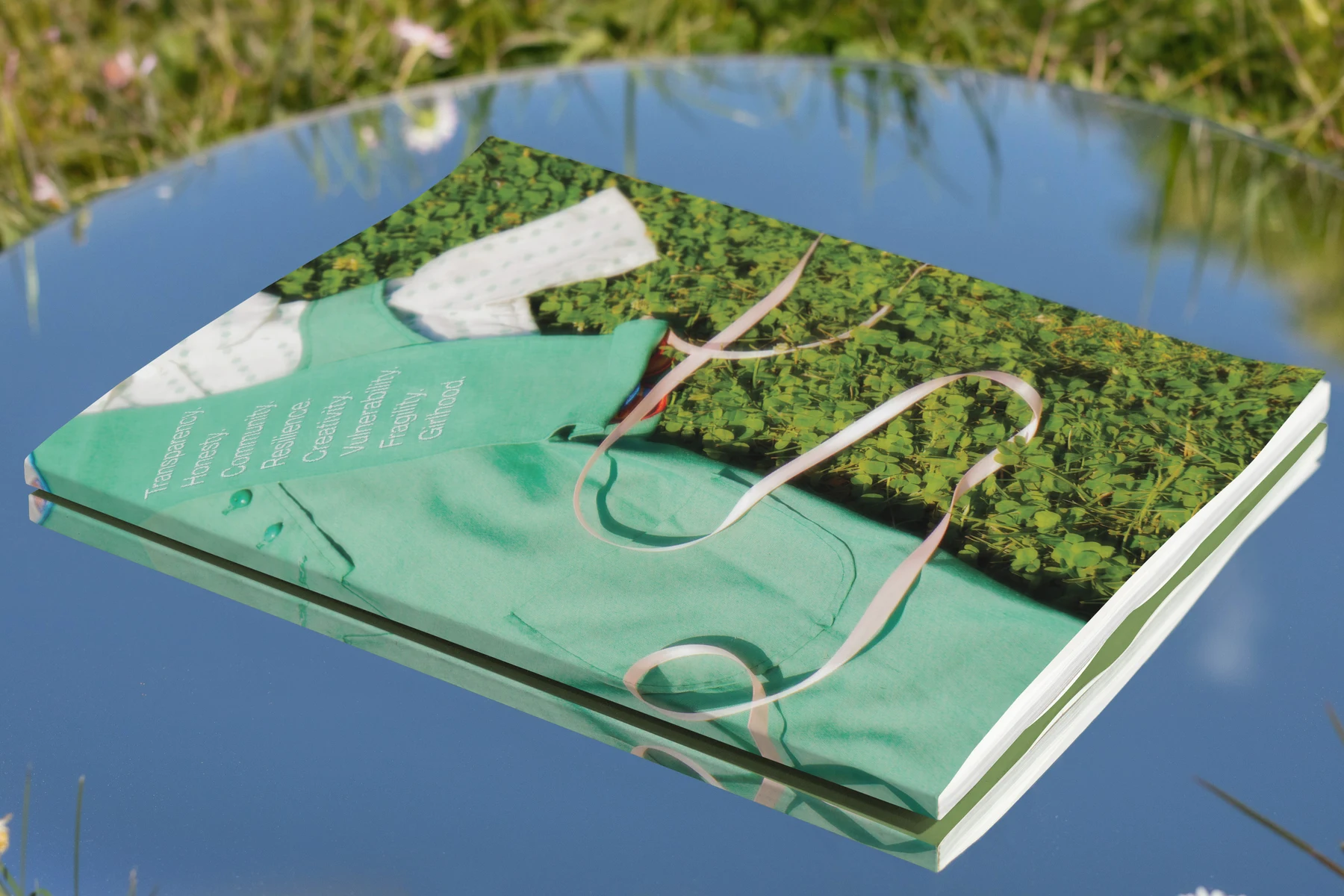 Glasshaus issue 01 face down on the water, back cover up