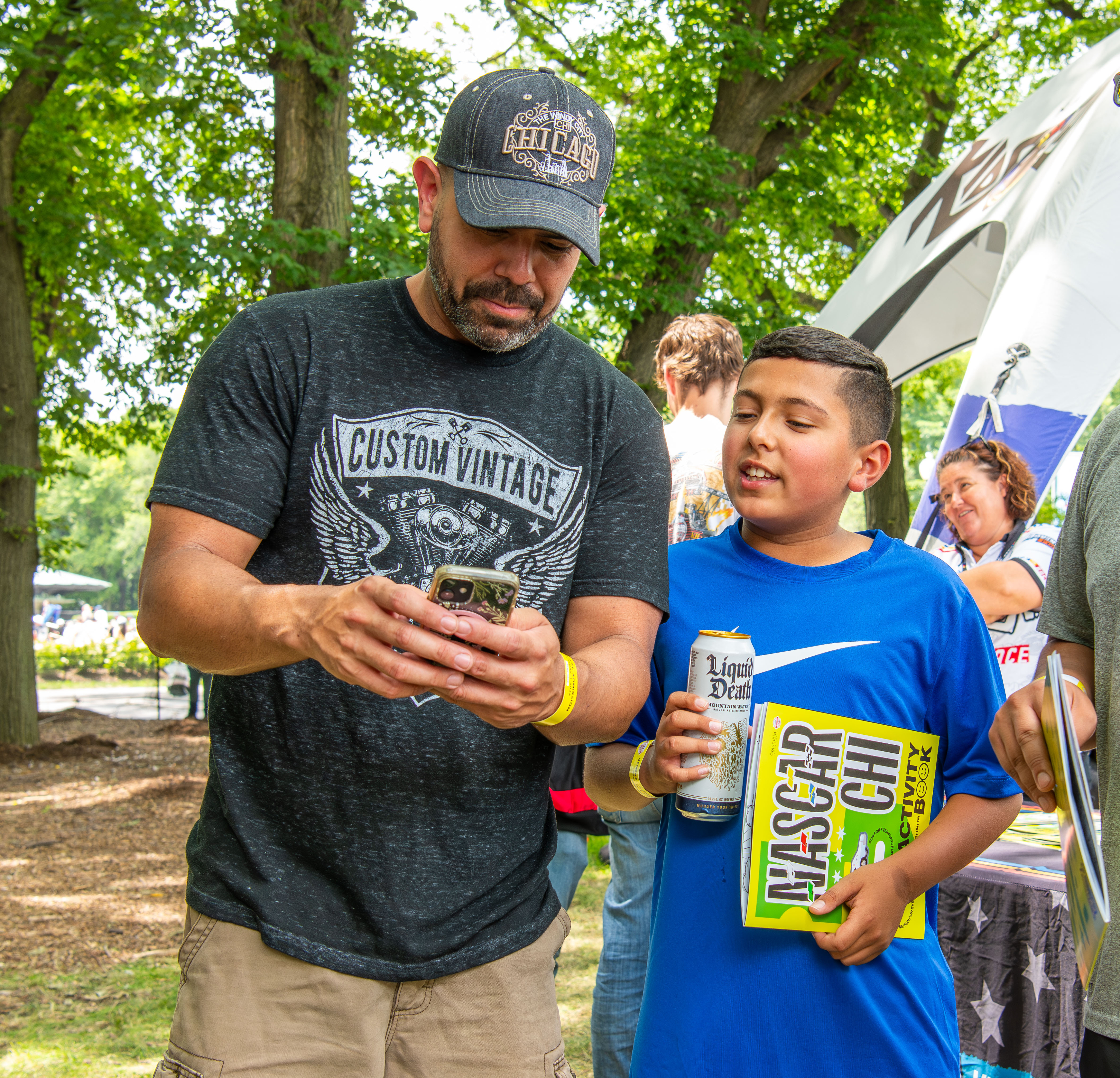 A father and son at the NASCAR event