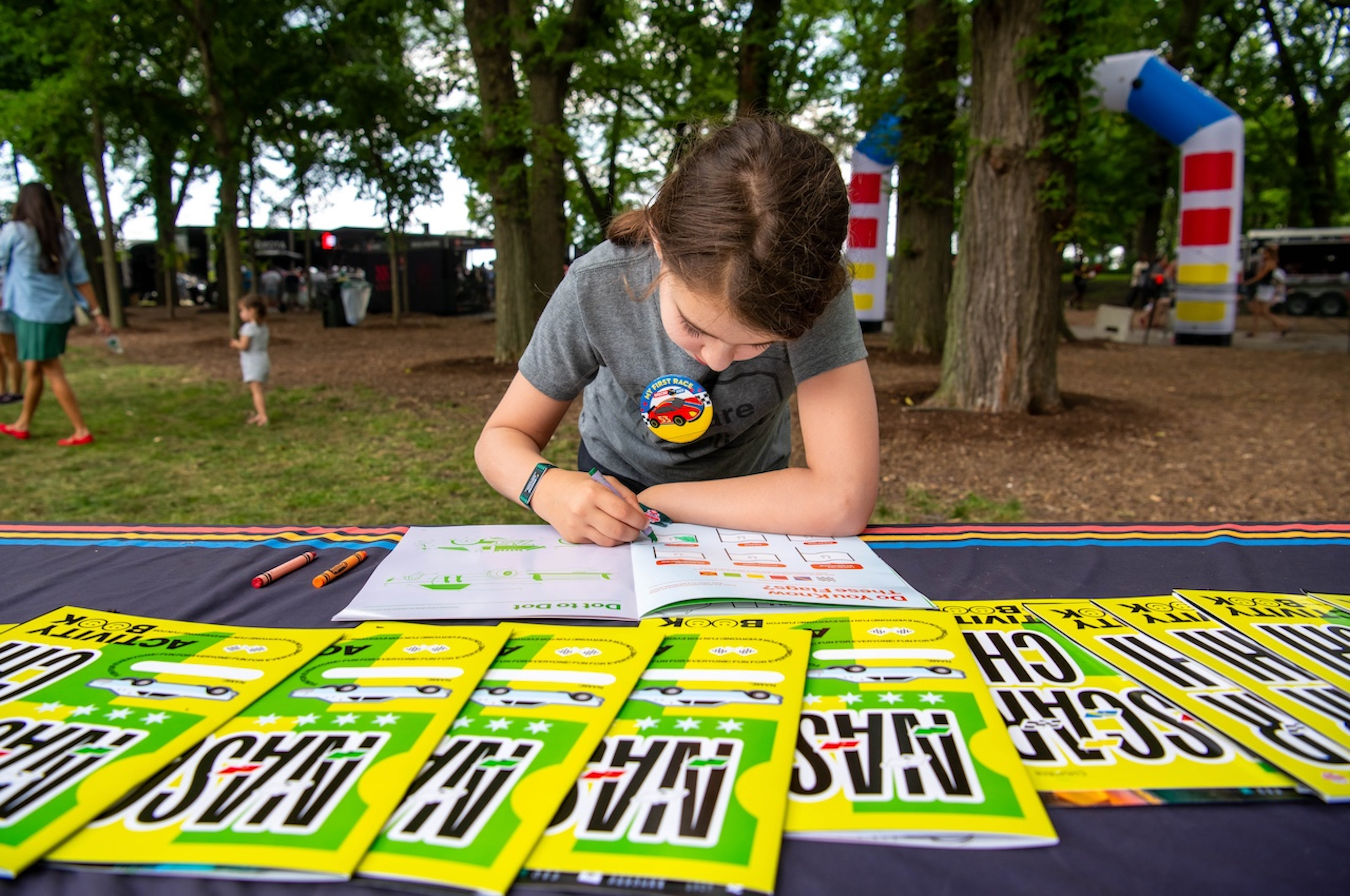 A child colouring at the NASCAR race day
